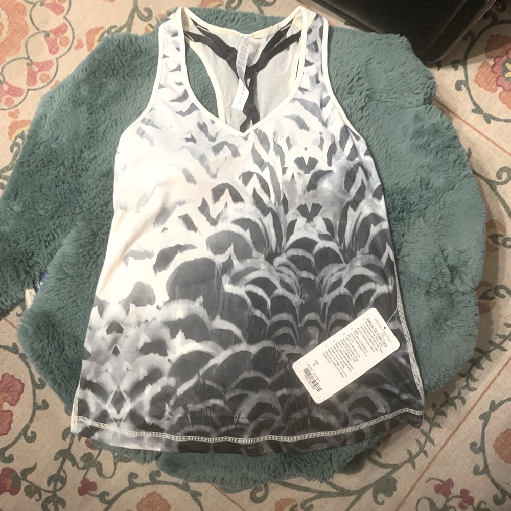 Lululemon dance to yoga tank pretty plume angel wing pattern (rare). BNWT size 8